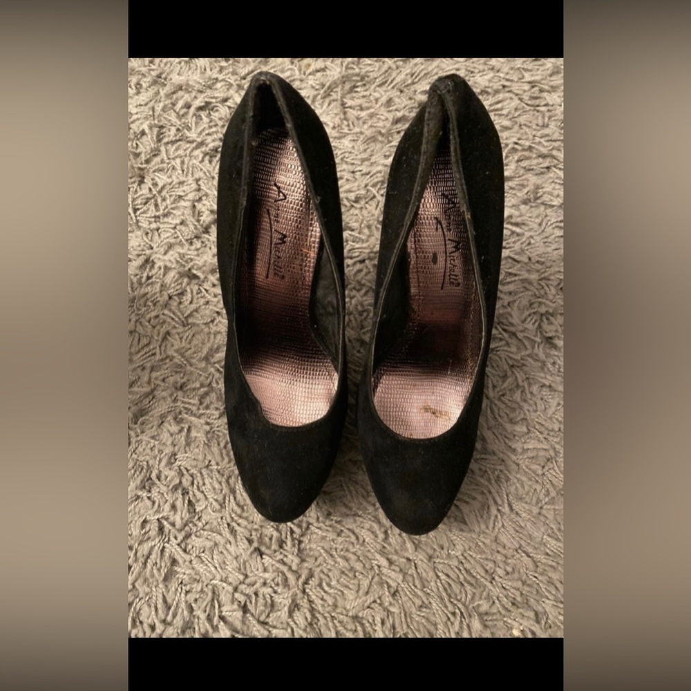 Black suede pumps